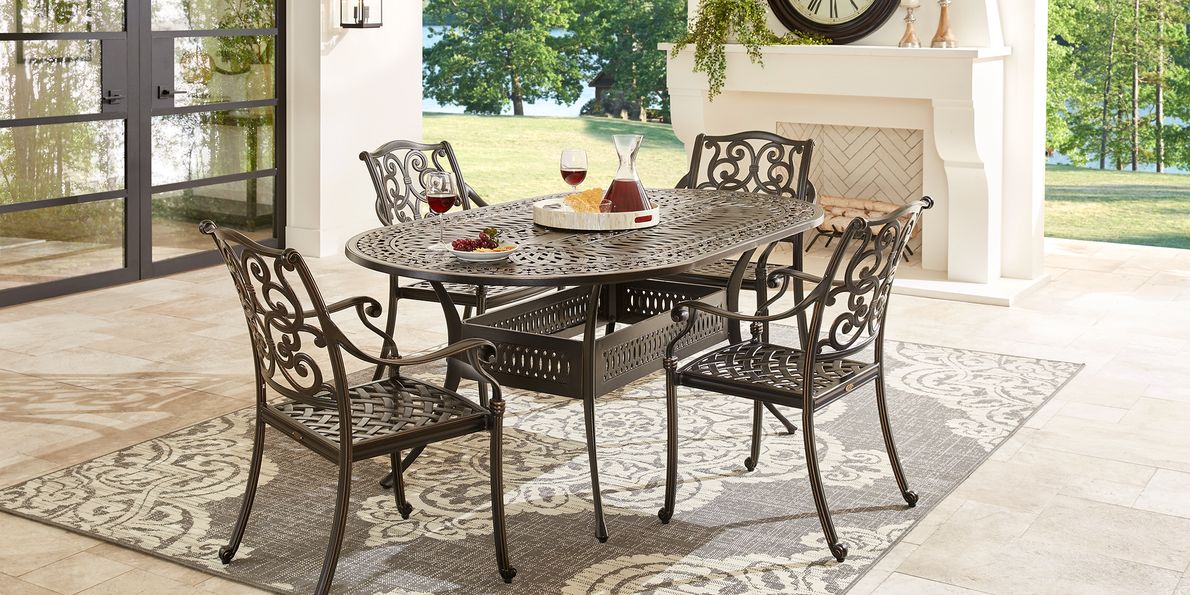 Oval outdoor best sale dining table set